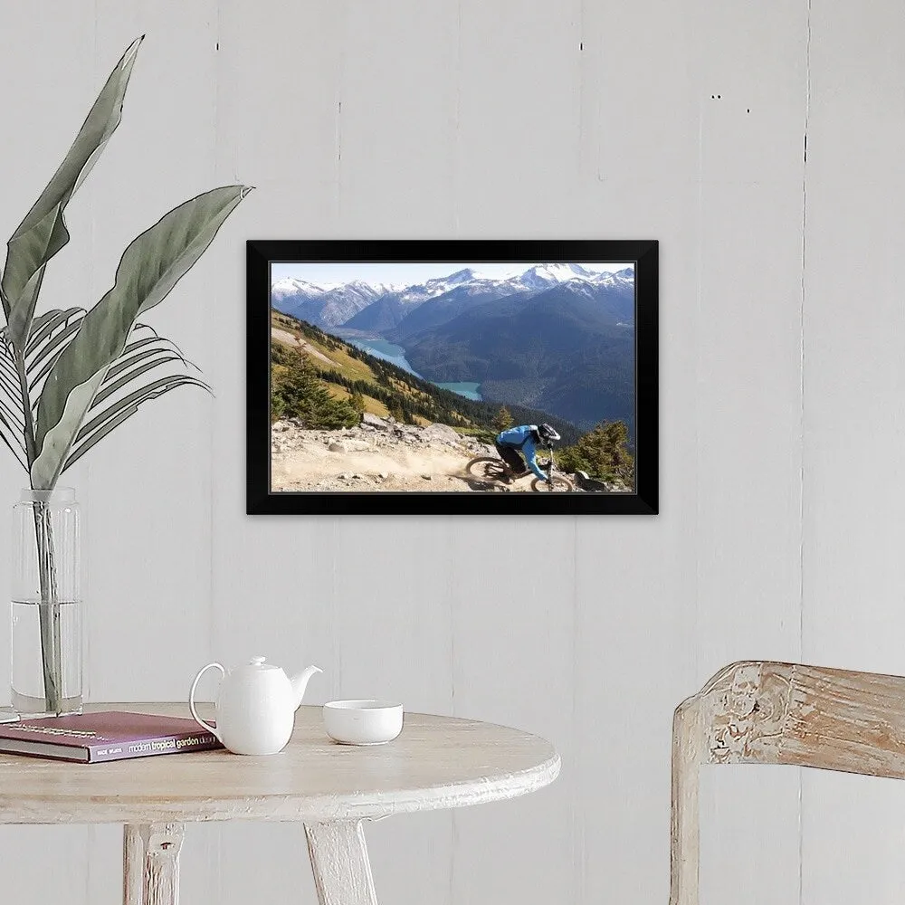 "Mountain biker riding on alpine trail" Black Framed Print