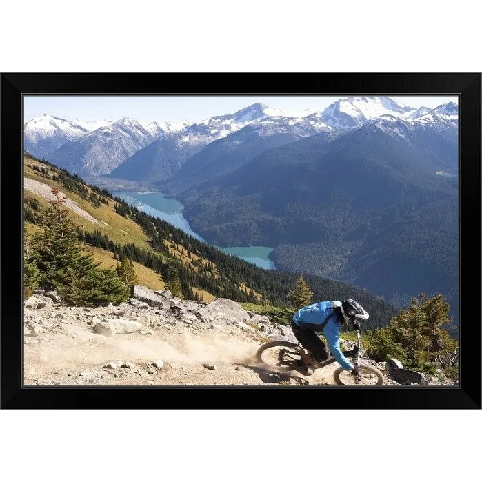 "Mountain biker riding on alpine trail" Black Framed Print
