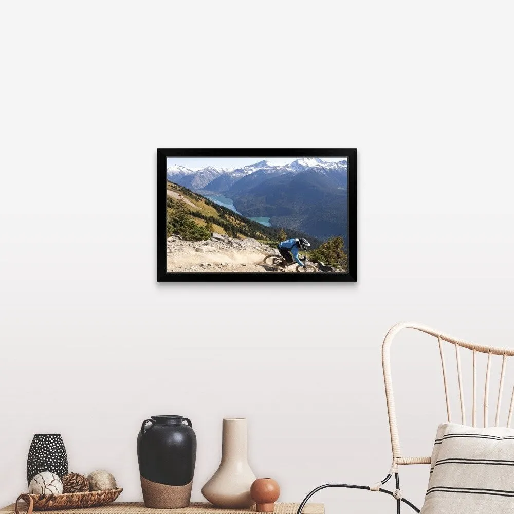 "Mountain biker riding on alpine trail" Black Framed Print